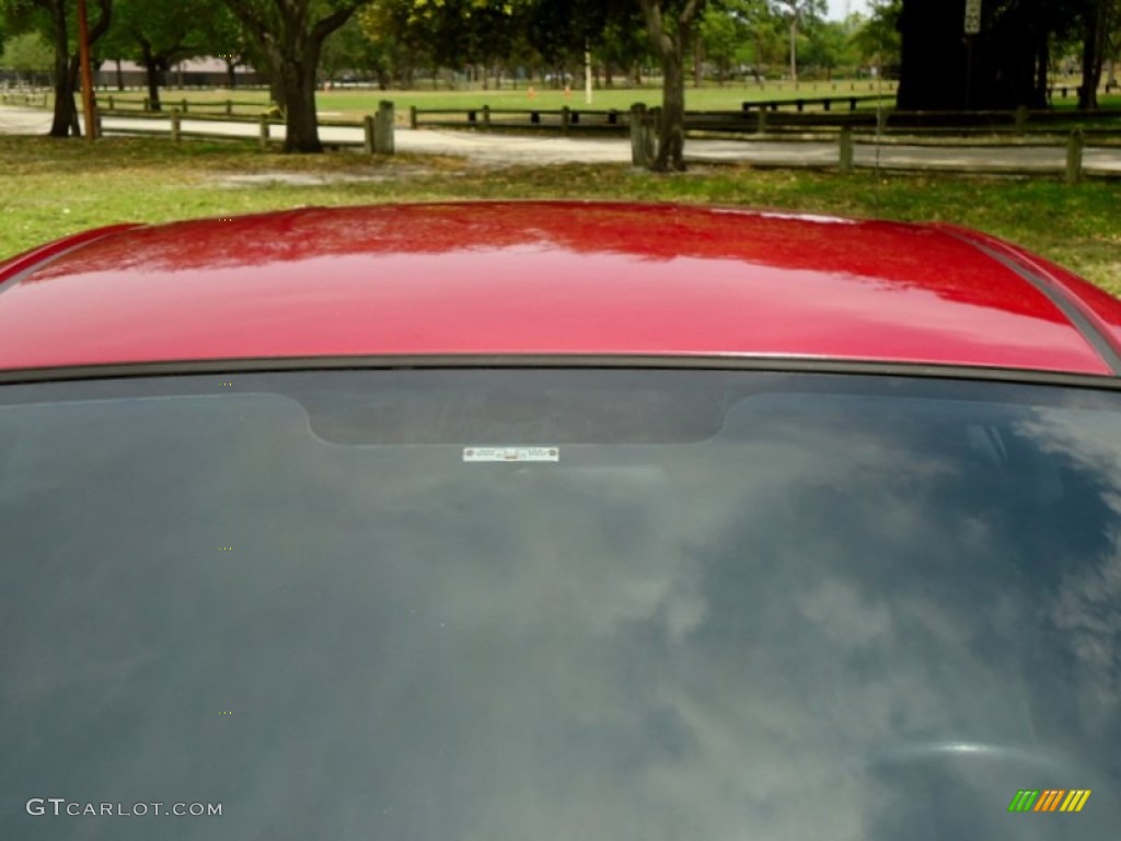 2006 Tiburon Tuscani - Electric Red / Black photo #33