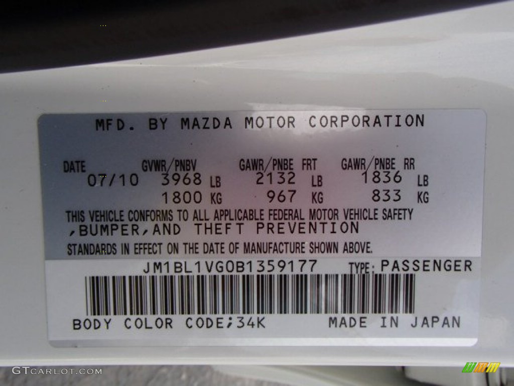 2011 MAZDA3 i Touring 4 Door - Crystal White Pearl Mica / Black photo #25