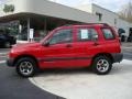 2000 Wildfire Red Chevrolet Tracker 4WD Hard Top  photo #1