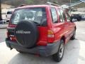 2000 Wildfire Red Chevrolet Tracker 4WD Hard Top  photo #4