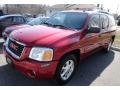 2004 Magnetic Red Metallic GMC Envoy XUV SLE 4x4  photo #2