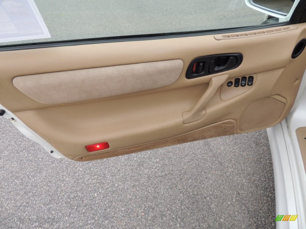 1999 Mitsubishi 3000GT Coupe Tan Door Panel Photo #79974302
