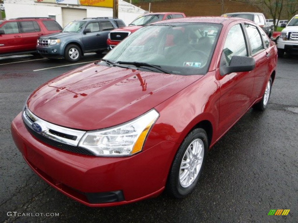 Sangria Red Metallic 2011 Ford Focus SE Sedan Exterior Photo #80006579