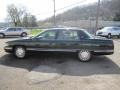 1996 Polo Green Metallic Cadillac DeVille Sedan  photo #28