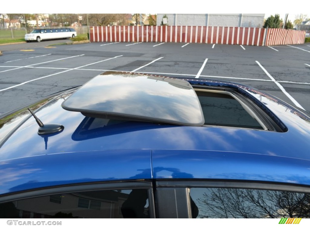 2005 Saturn ION 3 Quad Coupe Sunroof Photos