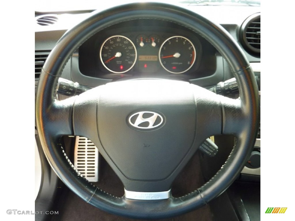 2004 Hyundai Tiburon GT Black Steering Wheel Photo #80103640