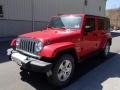 2010 Flame Red Jeep Wrangler Unlimited Sahara 4x4  photo #4