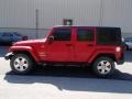2010 Flame Red Jeep Wrangler Unlimited Sahara 4x4  photo #5