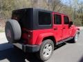 2010 Flame Red Jeep Wrangler Unlimited Sahara 4x4  photo #8