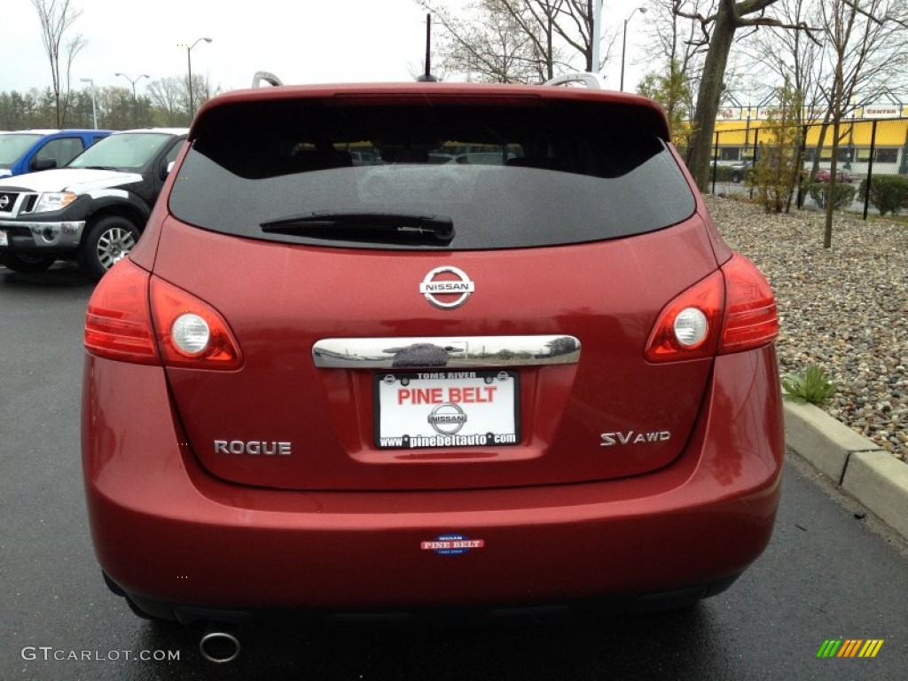 2011 Rogue SV AWD - Cayenne Red / Black photo #6