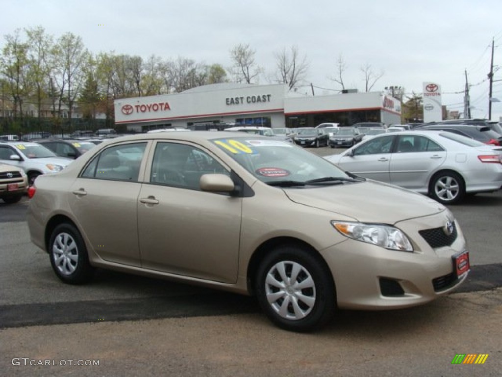 2010 Desert Sand Metallic Toyota Corolla Le #80117347 Photo #6 