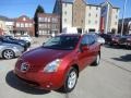 2010 Venom Red Nissan Rogue SL AWD  photo #1