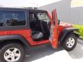 2010 Flame Red Jeep Wrangler Rubicon 4x4  photo #8