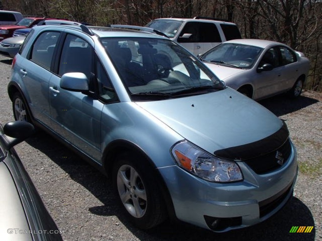 2009 SX4 Crossover Touring AWD - Vapor Blue Metallic / Black photo #1