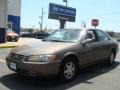 1999 Cashmere Beige Metallic Toyota Camry XLE  photo #1