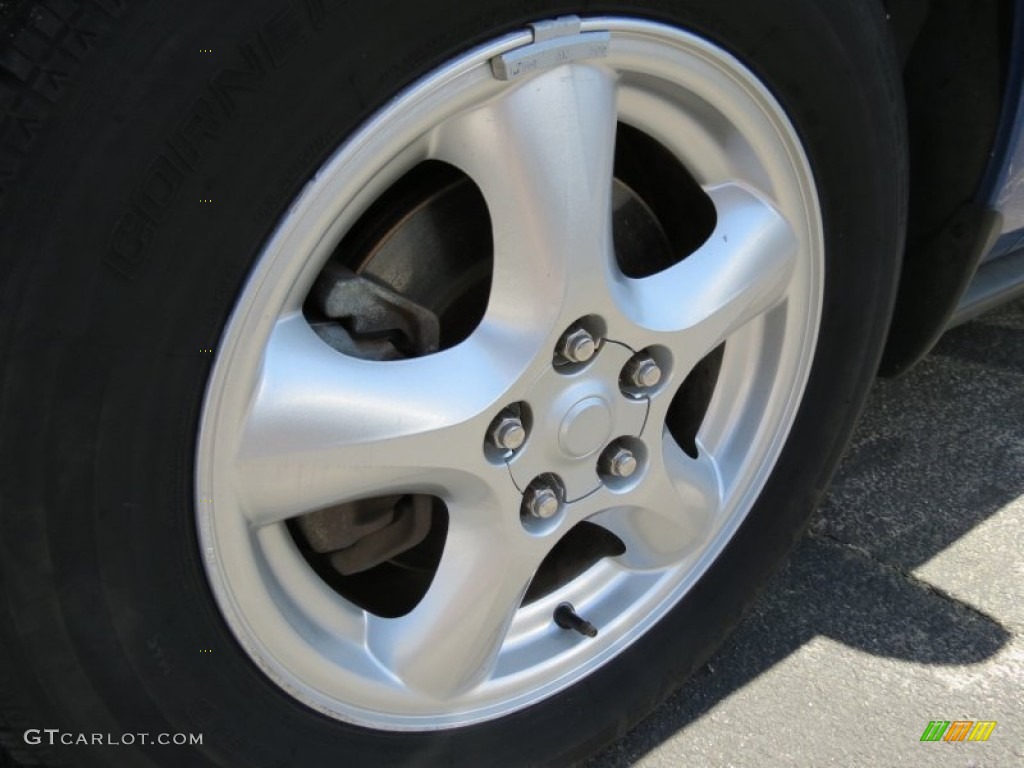 2003 Ford Taurus SE Wheel Photo #80259221