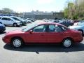 1999 Toreador Red Metallic Ford Taurus SE  photo #2