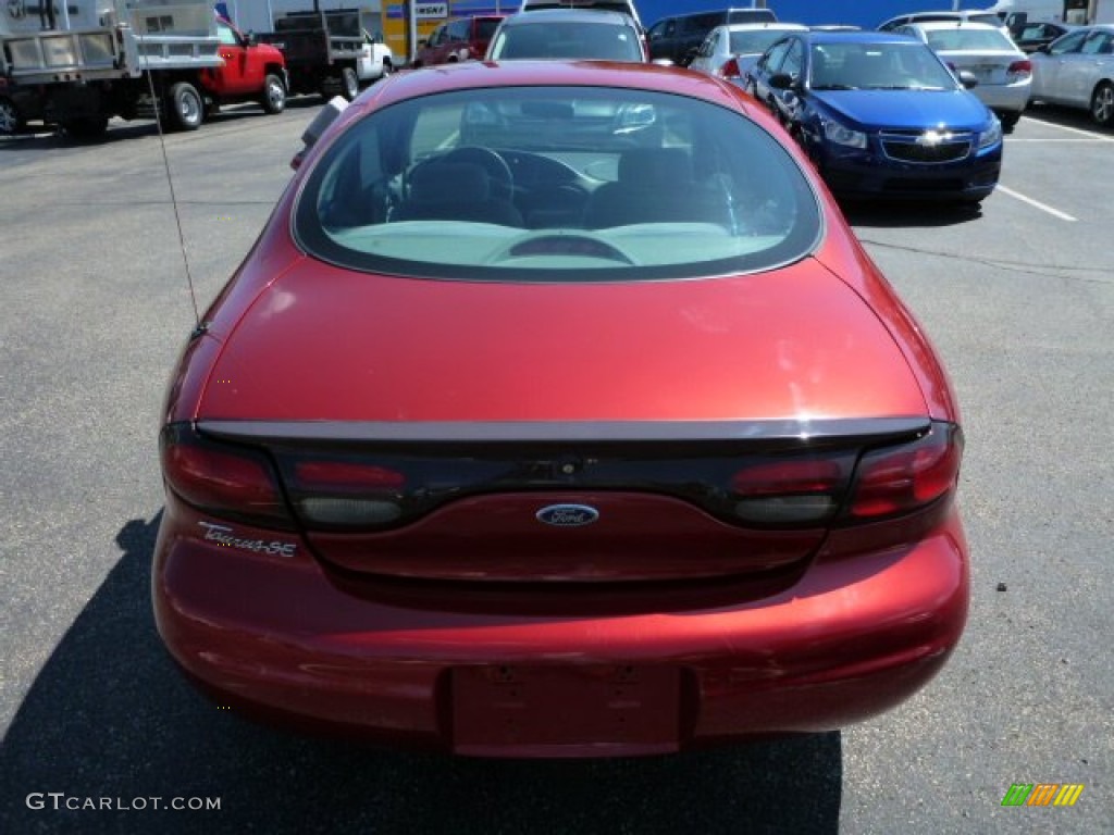 1999 Taurus SE - Toreador Red Metallic / Medium Graphite photo #12
