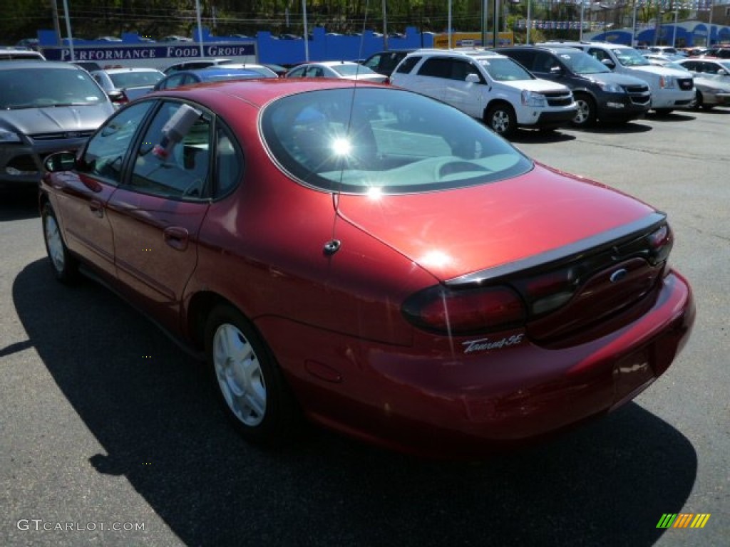 1999 Taurus SE - Toreador Red Metallic / Medium Graphite photo #13