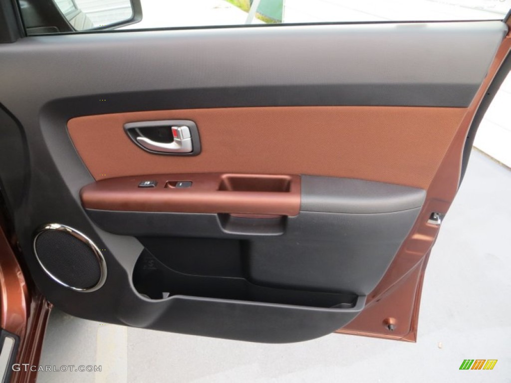 2012 Kia Soul Special Edition Red Rock Red Rock Brown Cloth/Black Leather Door Panel Photo #80299127
