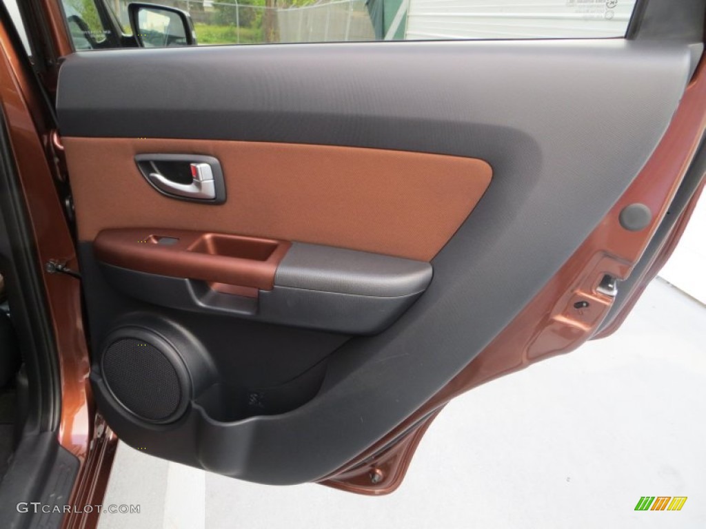 2012 Kia Soul Special Edition Red Rock Red Rock Brown Cloth/Black Leather Door Panel Photo #80299192