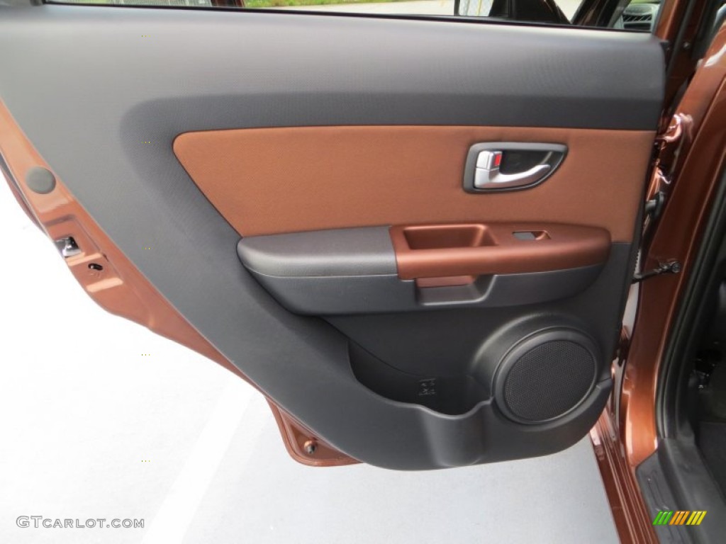 2012 Kia Soul Special Edition Red Rock Red Rock Brown Cloth/Black Leather Door Panel Photo #80299253
