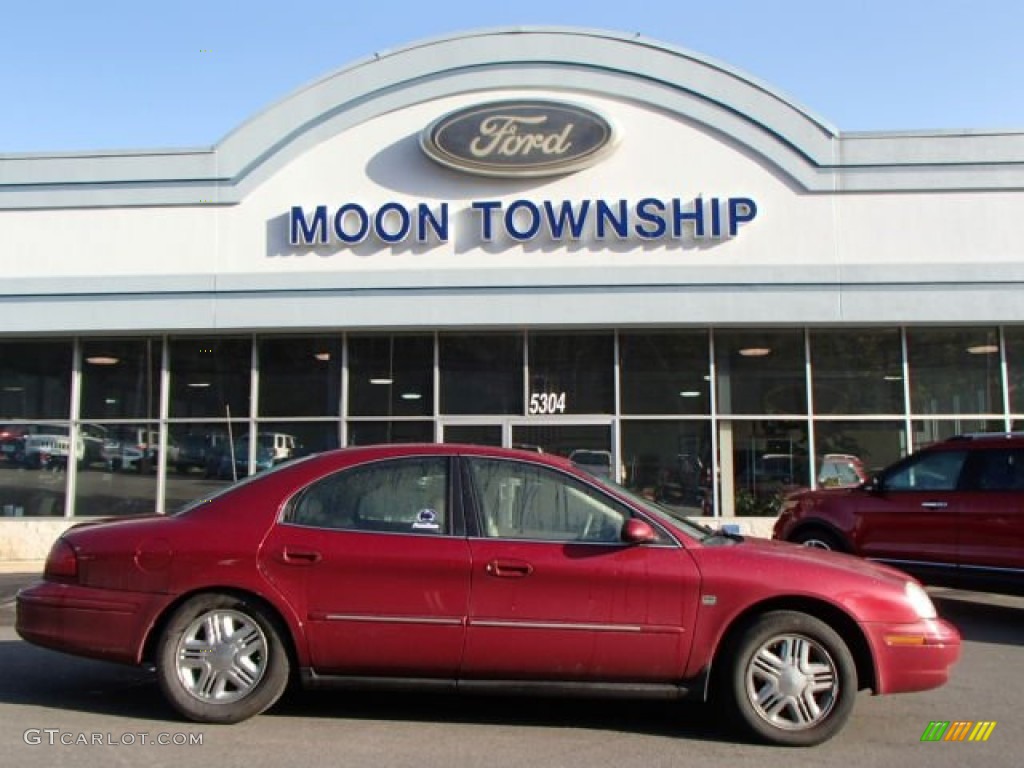 2003 Sable LS Premium Sedan - Matador Red Metallic / Medium Parchment photo #1
