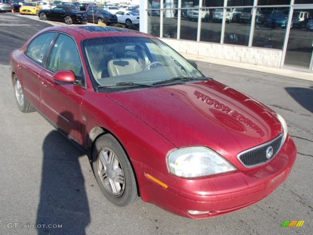 2003 Sable LS Premium Sedan - Matador Red Metallic / Medium Parchment photo #2