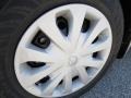 2013 Nissan Versa 1.6 SV Sedan Wheel and Tire Photo