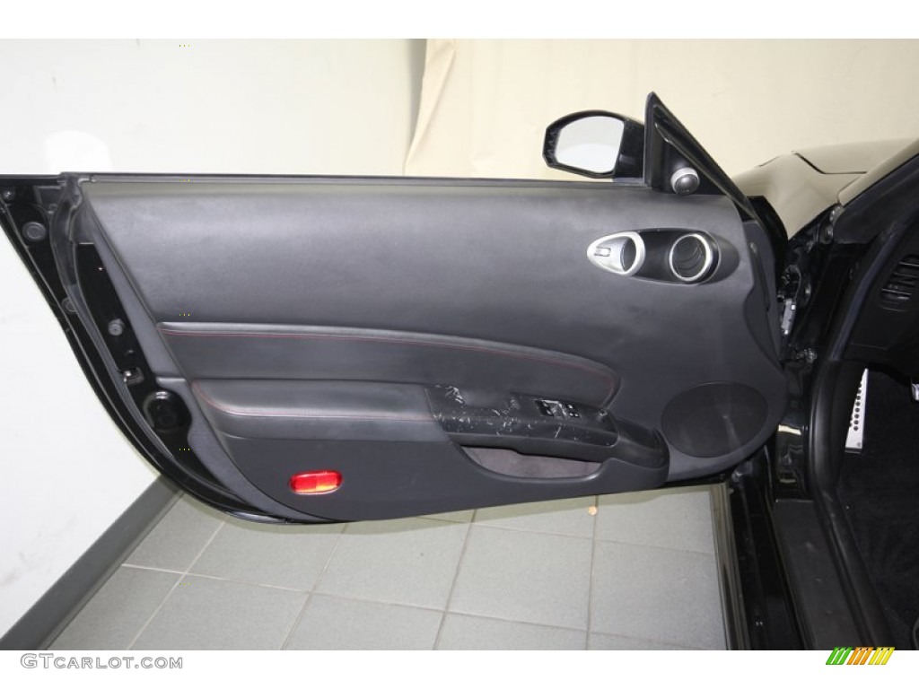 2007 Nissan 350Z NISMO Coupe Carbon/Red Door Panel Photo #80349405