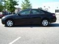 2009 Black Toyota Camry   photo #1