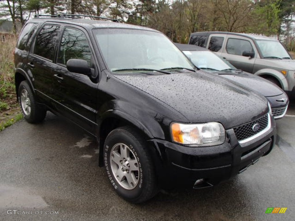 2003 Escape Limited 4WD - Black Clearcoat / Medium Dark Pebble photo #1