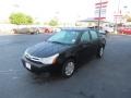 2011 Ebony Black Ford Focus S Sedan  photo #3