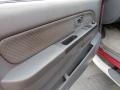 Gray 2004 Nissan Xterra SE Door Panel