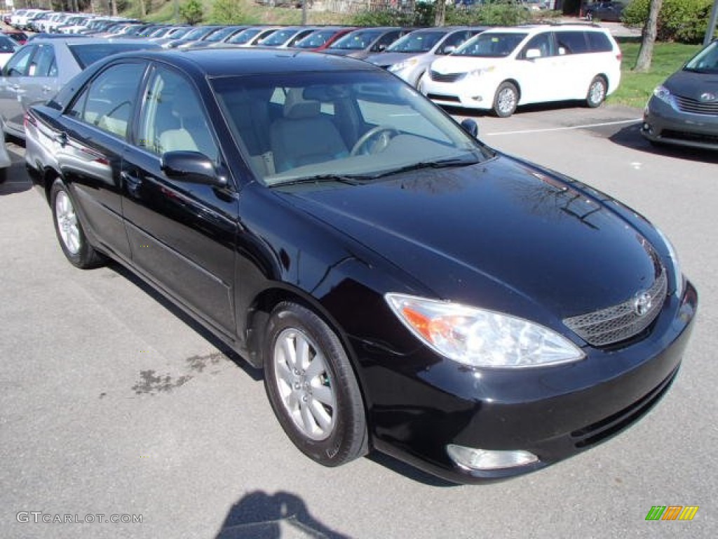 2004 Camry LE - Black / Stone photo #1