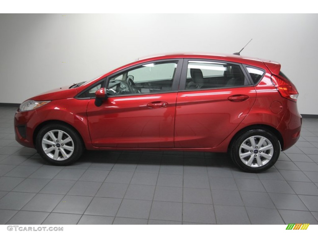 2011 Fiesta SE Hatchback - Bright Magenta Metallic / Charcoal Black/Blue Cloth photo #2
