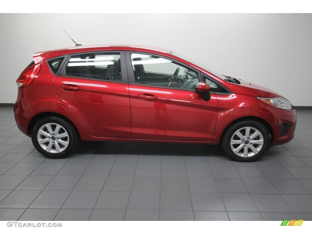 2011 Fiesta SE Hatchback - Bright Magenta Metallic / Charcoal Black/Blue Cloth photo #7