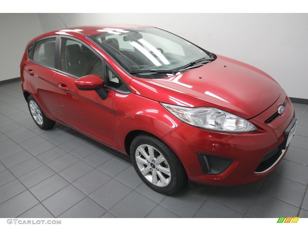 2011 Fiesta SE Hatchback - Bright Magenta Metallic / Charcoal Black/Blue Cloth photo #8