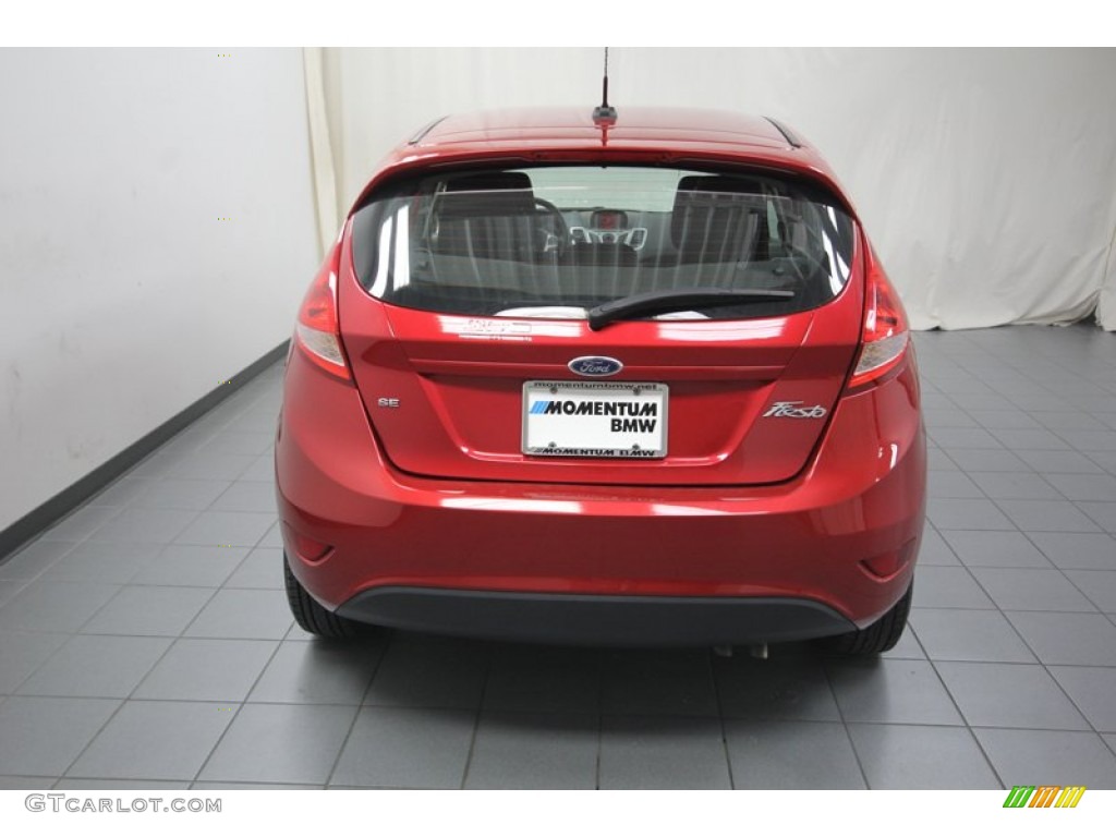 2011 Fiesta SE Hatchback - Bright Magenta Metallic / Charcoal Black/Blue Cloth photo #11