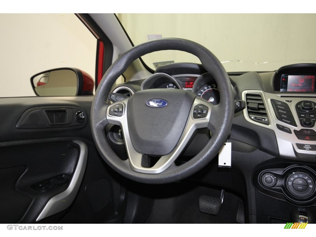 2011 Fiesta SE Hatchback - Bright Magenta Metallic / Charcoal Black/Blue Cloth photo #27