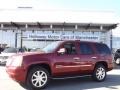 2009 Sonoma Red Metallic GMC Yukon Denali AWD  photo #1