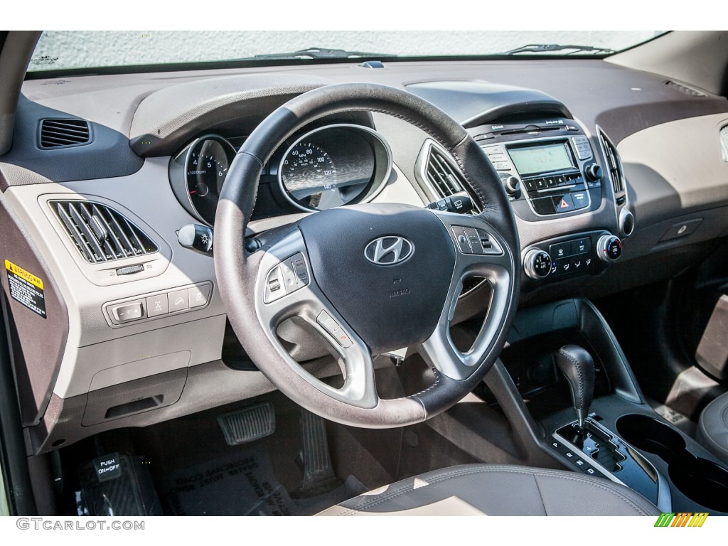 2010 Hyundai Tucson Limited AWD Taupe Dashboard Photo #80525569