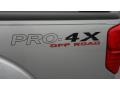2011 Nissan Frontier Pro-4X Crew Cab 4x4 Badge and Logo Photo