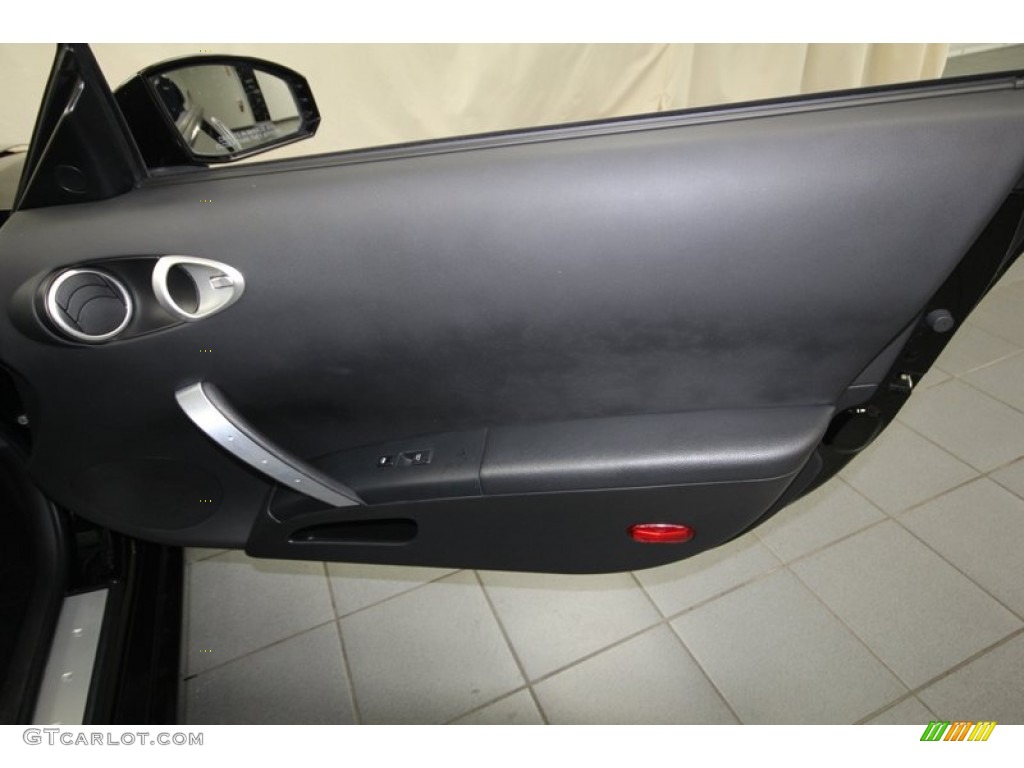 2005 Nissan 350Z Enthusiast Coupe Carbon Door Panel Photo #80537443