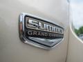 2014 Jeep Grand Cherokee Summit Badge and Logo Photo