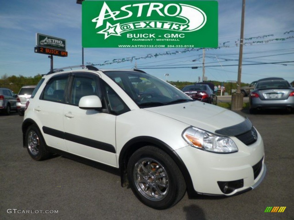 2008 SX4 Crossover Touring AWD - White Water Pearl / SWT Black/Red photo #1