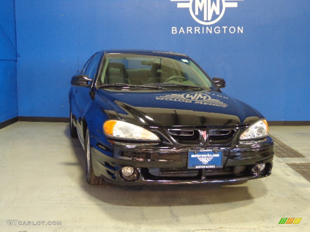 2000 Grand Am GT Sedan - Black / Dark Taupe photo #1