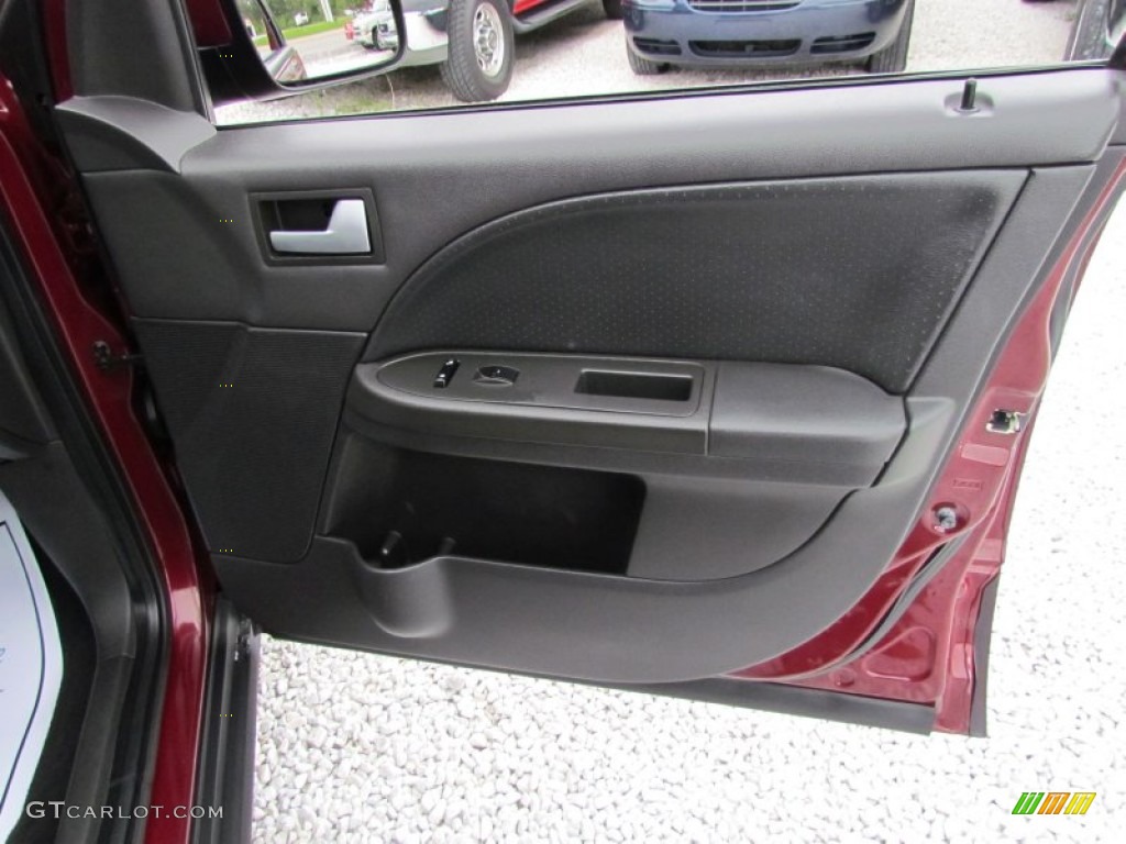 2005 Ford Freestyle Limited AWD Black Door Panel Photo #80663700