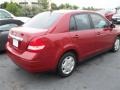 2009 Red Brick Nissan Versa 1.8 S Sedan  photo #5