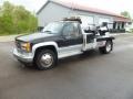 Front 3/4 View of 2002 Sierra 3500 SL Regular Cab Tow Truck